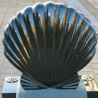 carved sea shell headstone